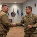 110th Wing Tech. Sgt. Zach Chartier receives command coin