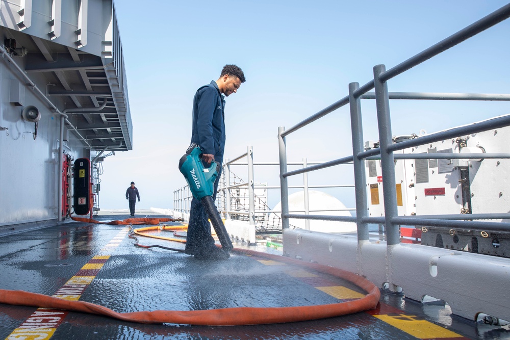 Makin Island Sailors Clean the Flight Deck