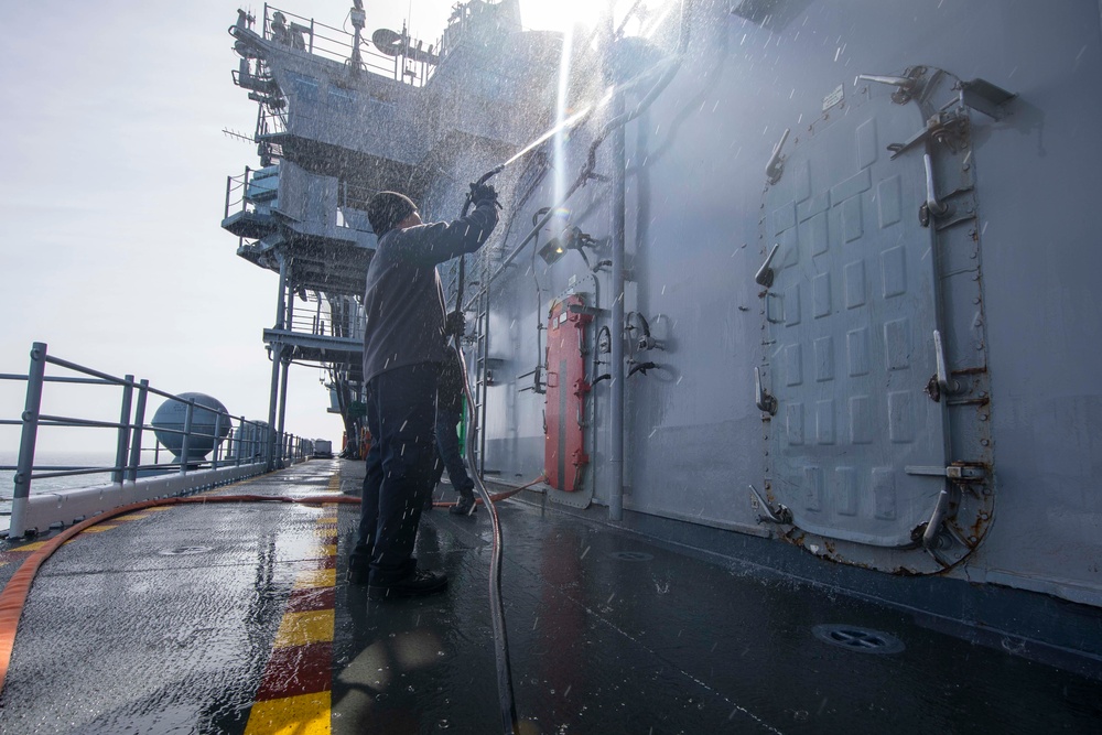 Makin Island Sailors Clean the Flight Deck