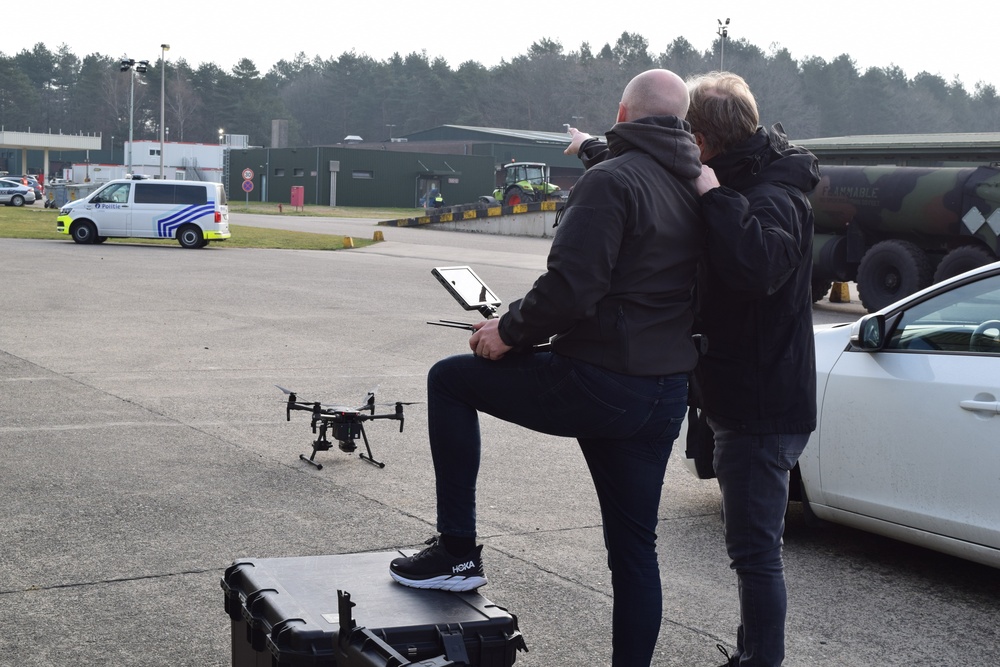 Emergency response drone team discusses flight path