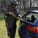 Belgian bomb squad member attempts to open suspect car in exercise