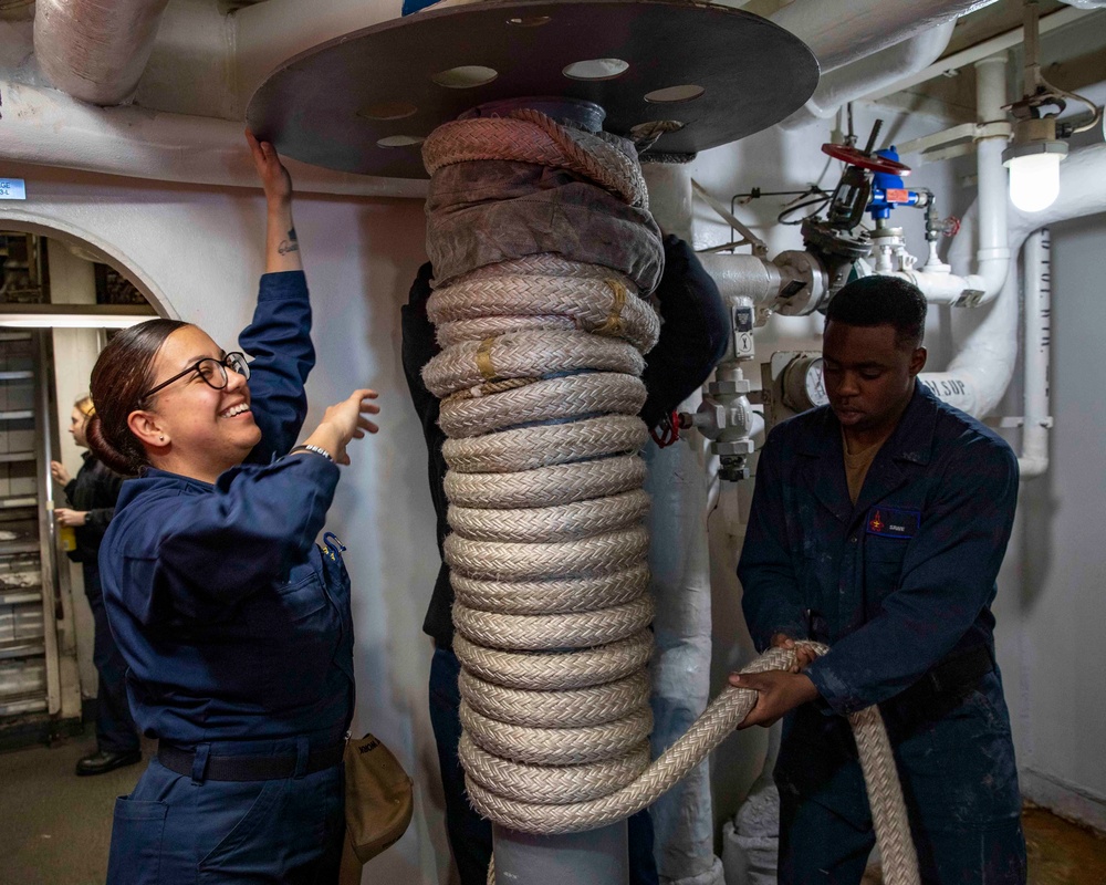 Sailors Stow Mooring Lines