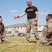 Competitors execute combatives portion of the Best Leader Competition