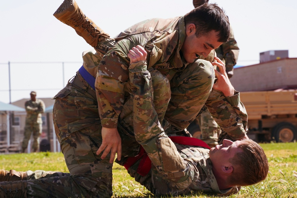 Competitors execute combatives portion of the Best Leader Competition