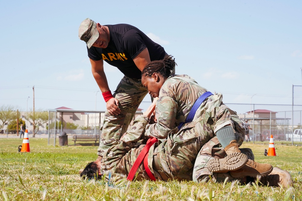 Competitors execute combatives portion of the Best Leader Competition