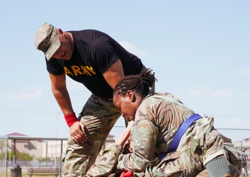 Competitors execute combatives portion of the Best Leader Competition