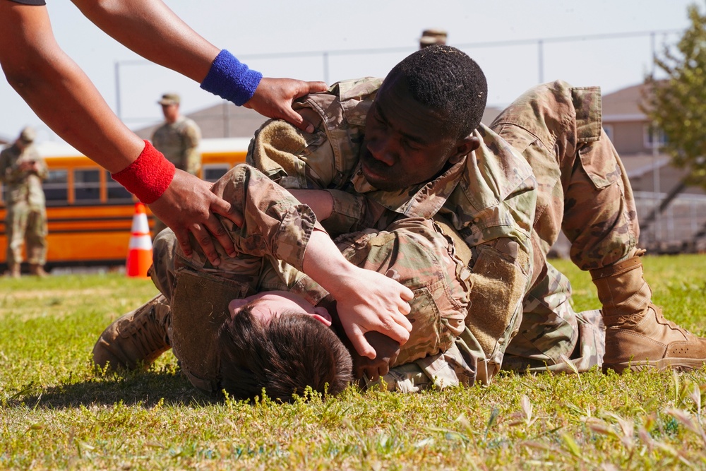 Competitors execute combatives portion of the Best Leader Competition