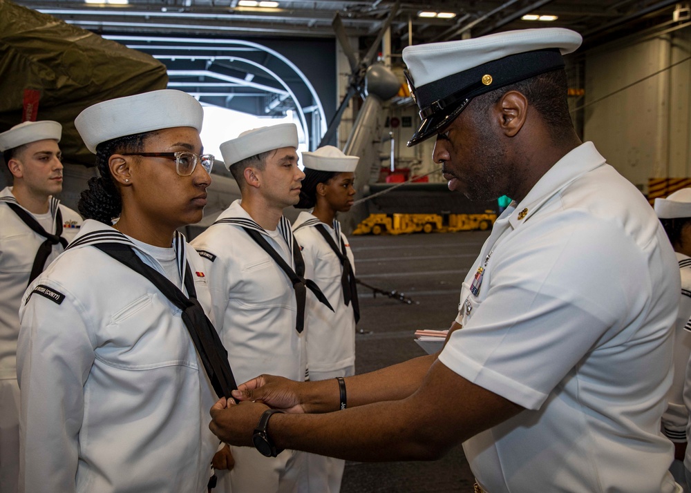 GHWB Sailors Complete a Service Dress Uniform Inspection