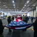 Sailors Fold A Ceremonial Flag