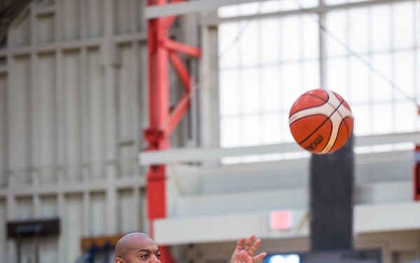 Retired U.S. Army Spc Brent Garlic Throws a basketball