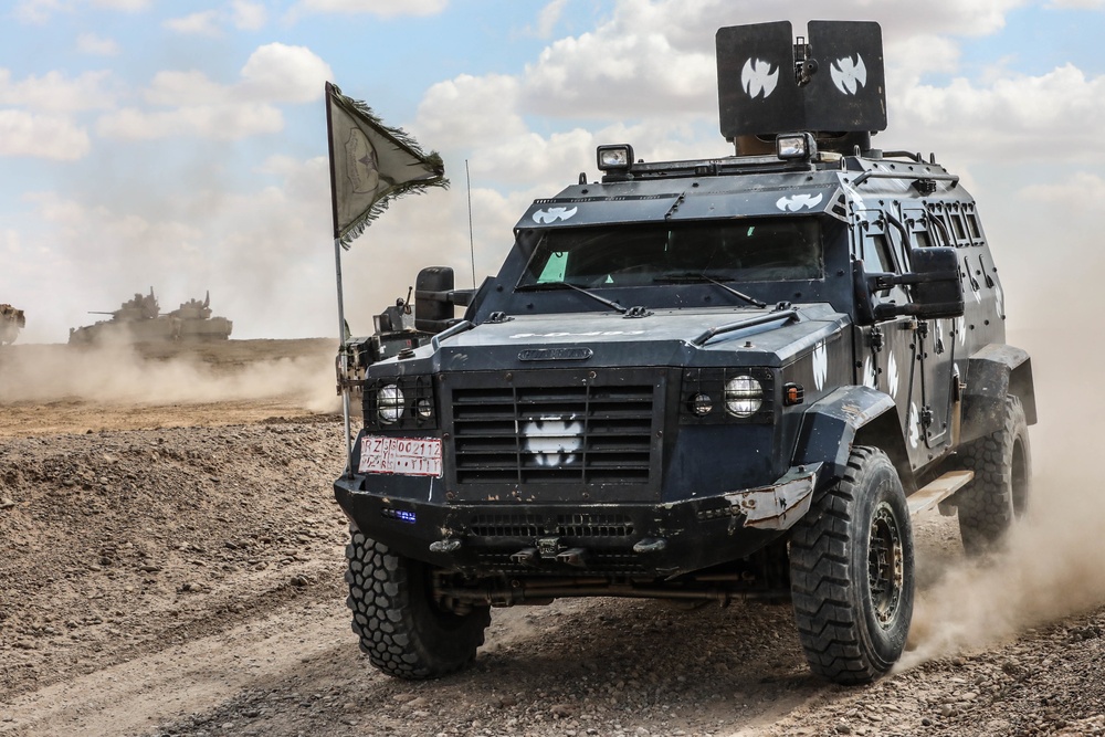 U.S. soldiers conduct live fire exercise alongside the Syrian Defense Forces