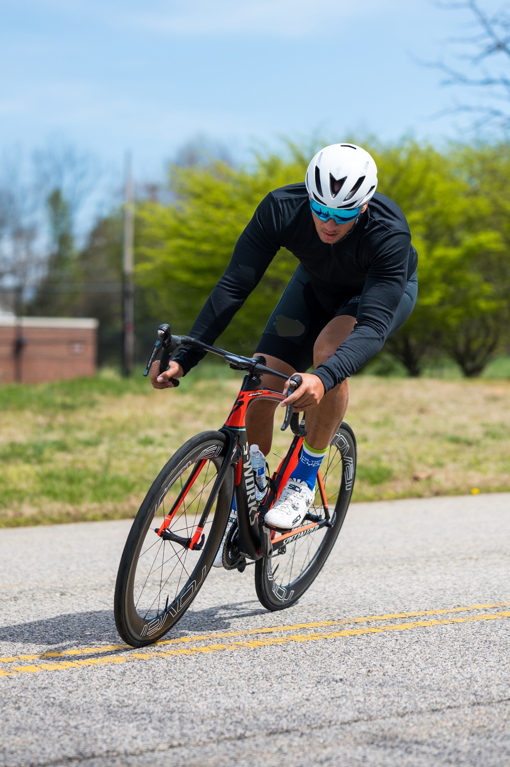 Retired U.S. Army Master Sgt. Earl Ohlinger rides bike