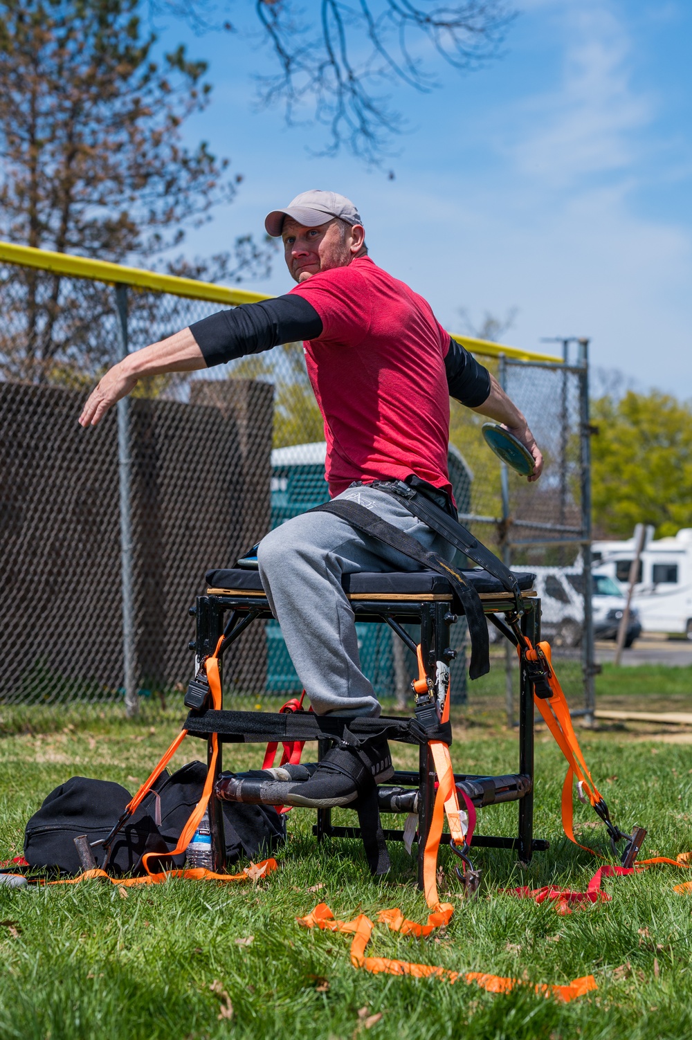 Retired Sergeant 1st Class Josh Olson throwing a discus