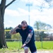 Retired U.S. Army Staff Sgt Ross Alewine throws a shot putt