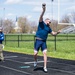 Retired U.S. Army Staff Sgt Ross Alewine throws a shot putt