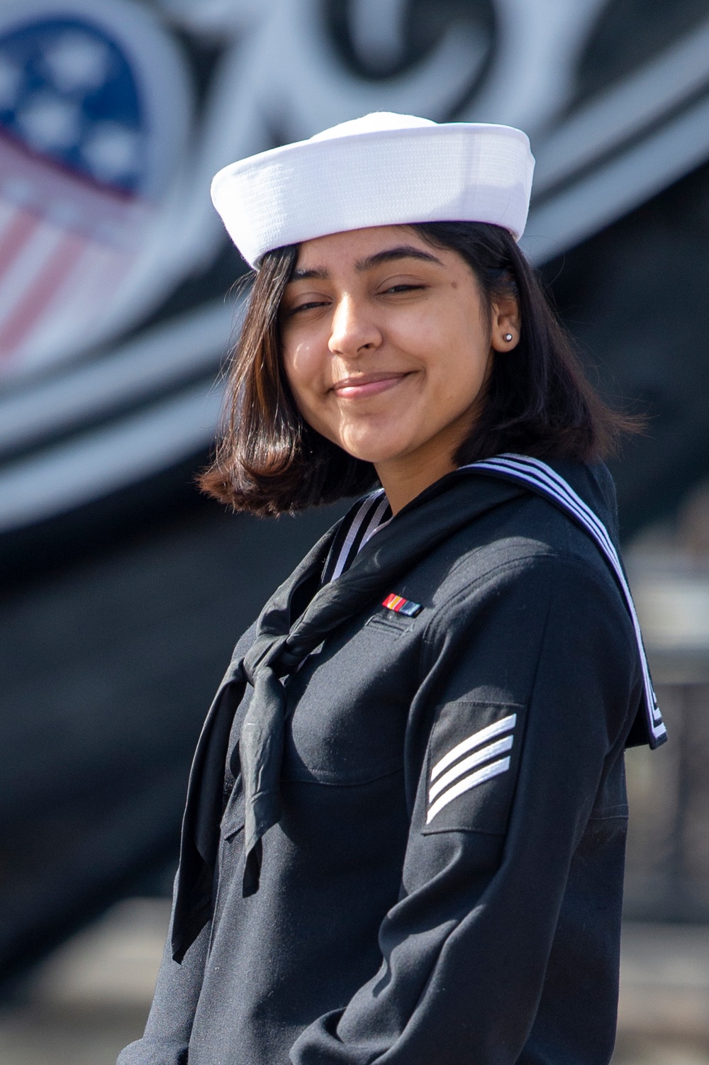 Seaman Raquel Figueroa, poses for a photo onboard the ship