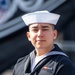 Seaman Christian Cerda, poses for a photo onboard the ship