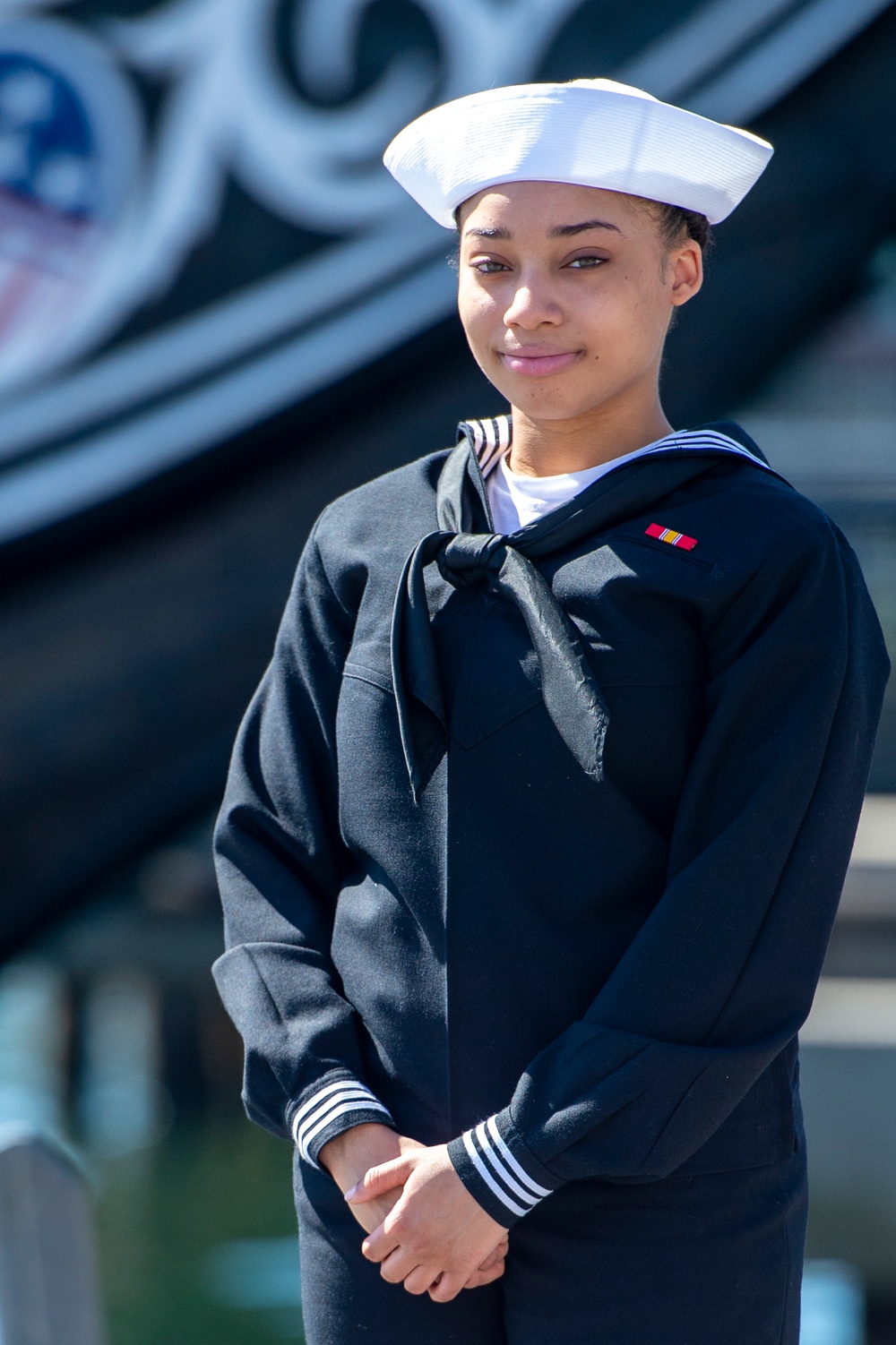 Seaman Andrea Wilson, poses for a photo onboard the ship
