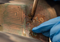 Maintenance repairs first CV-22 Osprey heat blanket