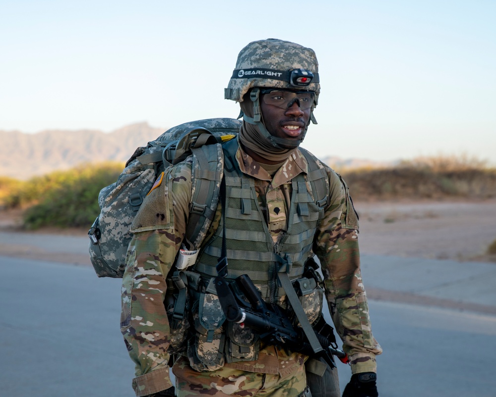 Soldiers ruck march 15 miles in the Regional Health Command-Central Best Leader Competition