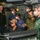 Abraham Lincoln Sailors and JMSDF military leaders observe a sonar module