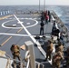 Marines aboard USS Ross hold small arms shoot