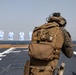 Marines aboard USS Ross hold small arms shoot