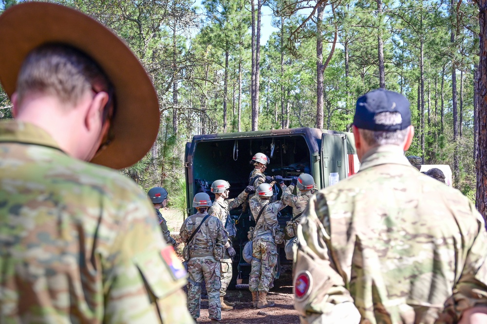 Multinational military attachés talk initial entry training