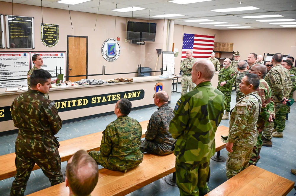 Multinational military attachés talk initial entry training