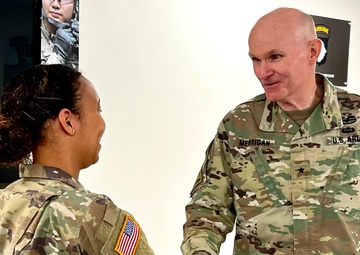 84th Training Command Deputy Commanding General Edward Merrigan awards Soldier for excellence.