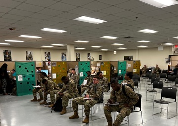Soldiers with the 135th Expeditionary Sustainment Command conduct Soldier Readiness Processing