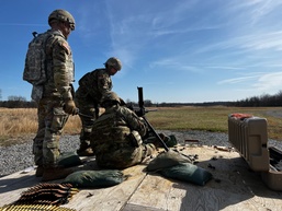 Soldiers from the 135th MOBEX conducting weapons clearing procedures
