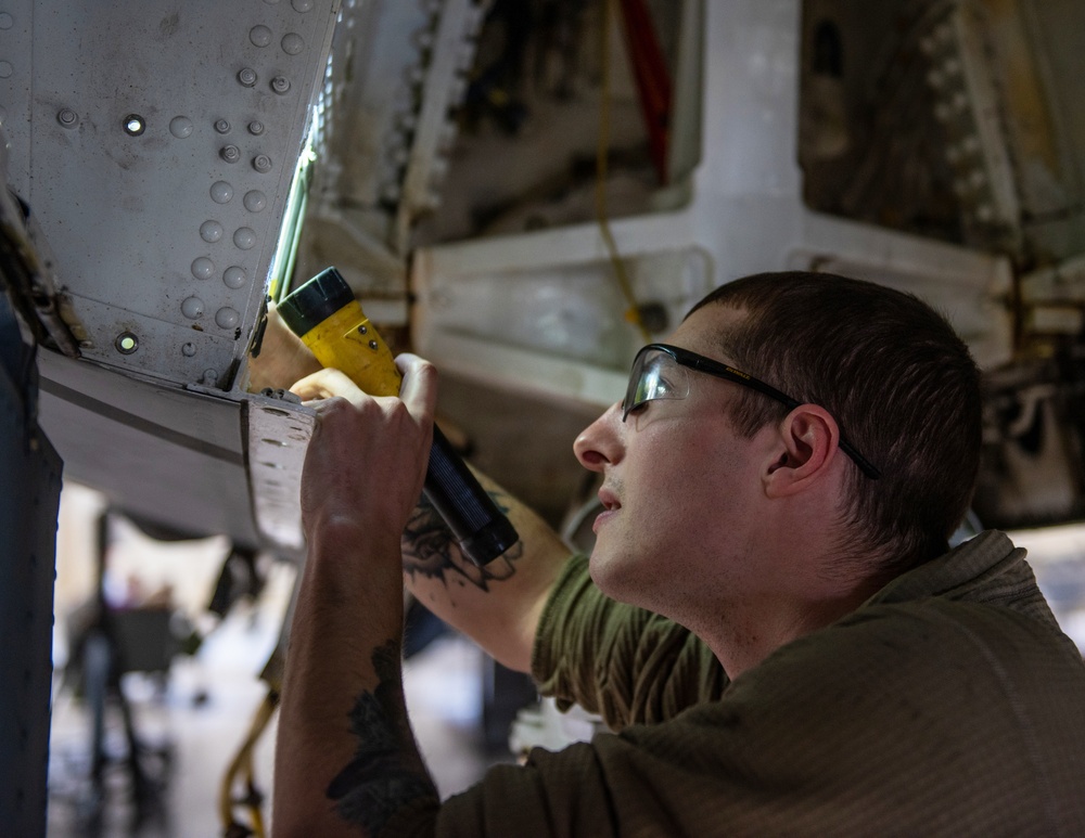 Maintenance Squadron performs a hard landing inspection on tanker