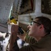 Maintenance Squadron performs a hard landing inspection on tanker