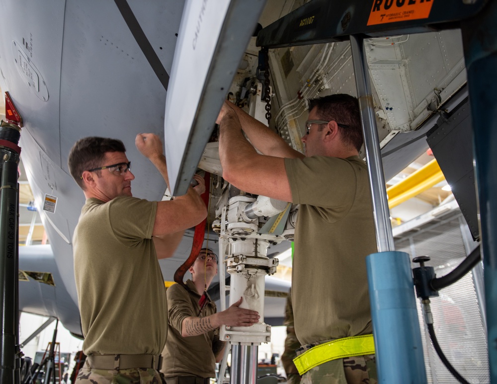 Maintenance Squadron performs a hard landing inspection on tanker