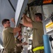 Maintenance Squadron performs a hard landing inspection on tanker