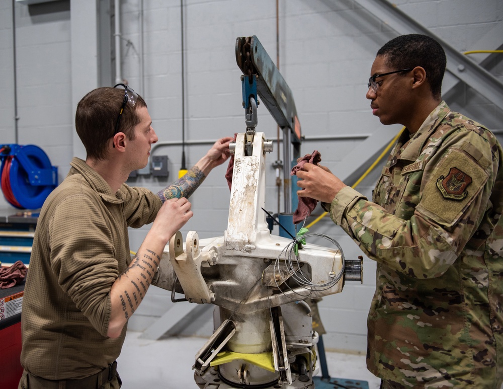 Maintenance Squadron performs a hard landing inspection on tanker