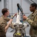 Maintenance Squadron performs a hard landing inspection on tanker