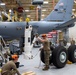 Maintenance Squadron performs a hard landing inspection on tanker