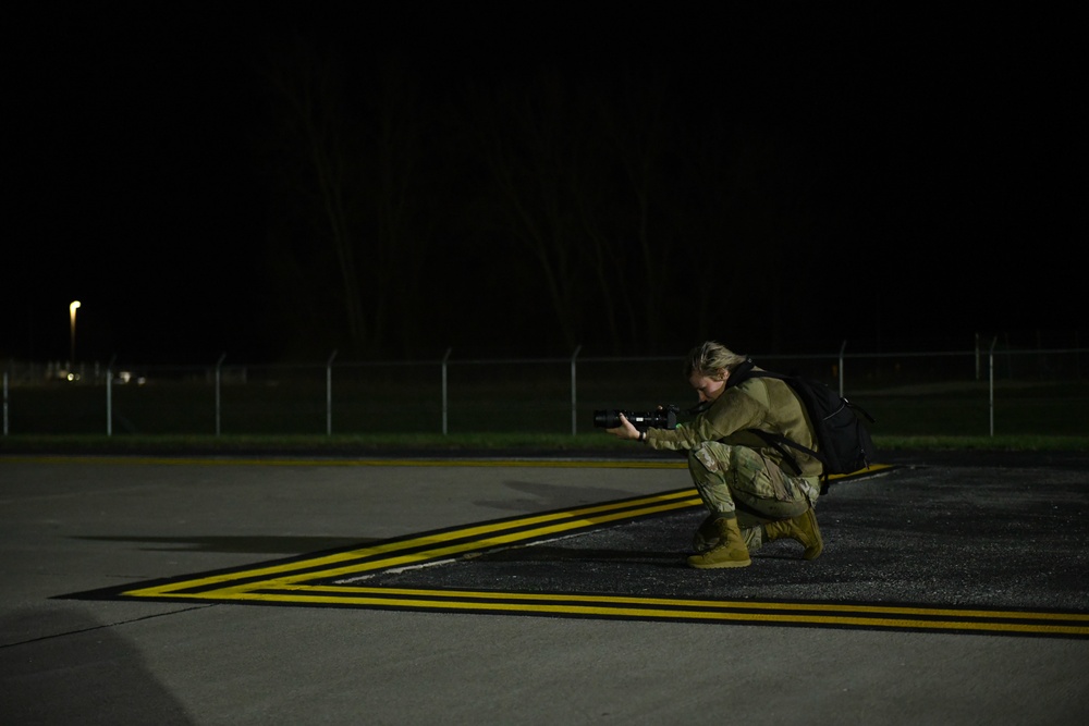 131st Bomb Wing Air National Guard public affairs apprentice shoots exercise night operations