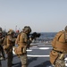 Marines aboard USS Ross hold small arms shoot