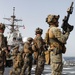 Marines aboard USS Ross hold small arms shoot