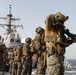 Marines aboard USS Ross hold small arms shoot