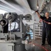 GHWB Sailor Cleans Weapon