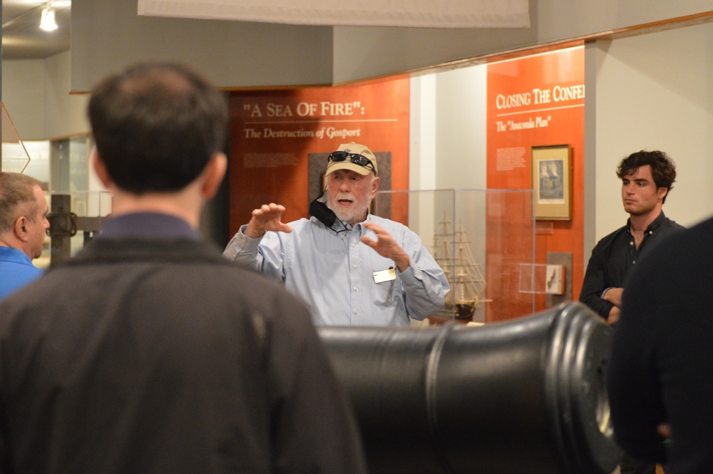 Museum volunteer leads guided tour