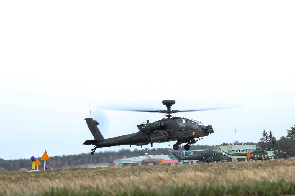 Air Cavalry Soldier Conducts Repairs on an AH-64 Electrical System