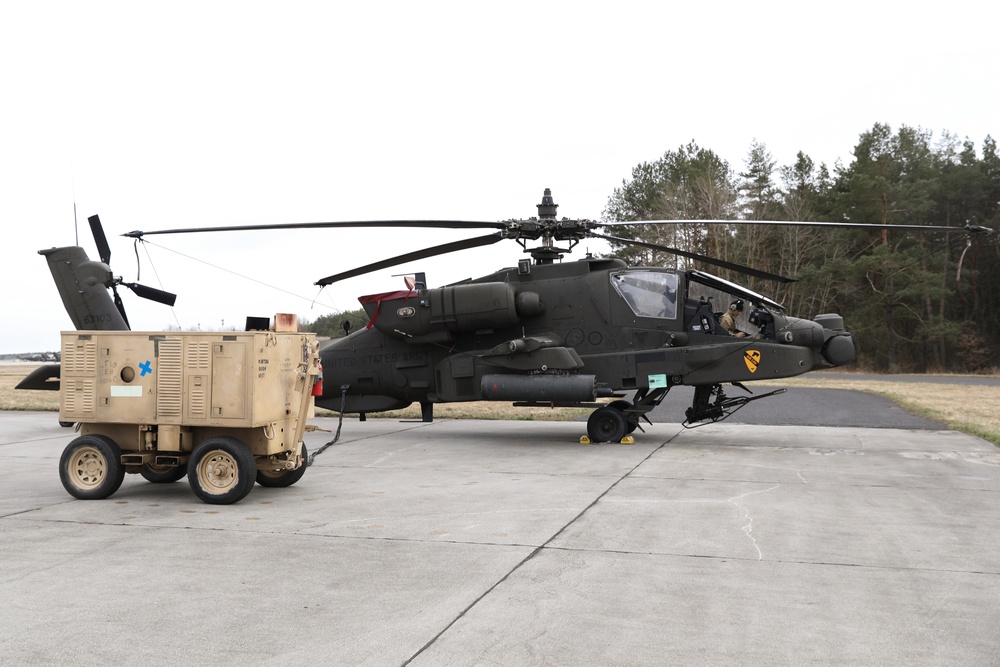 Air Cavalry Soldier Conducts Repairs on an AH-64 Electrical System