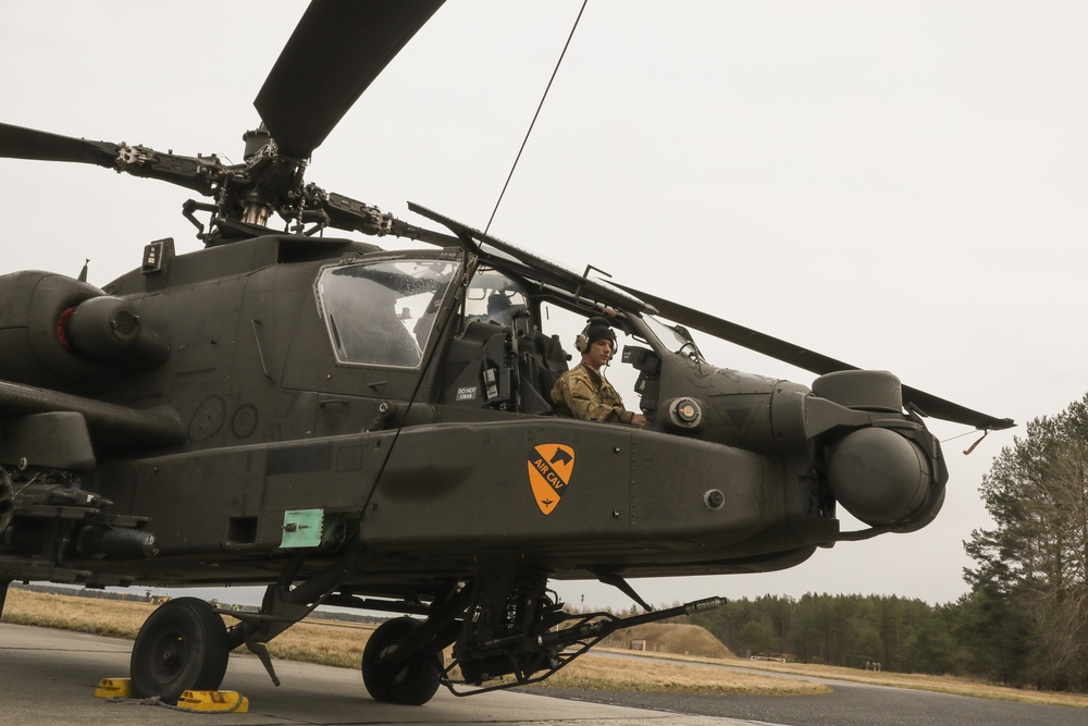 Air Cavalry Soldier Conducts Repairs on an AH-64 Electrical System