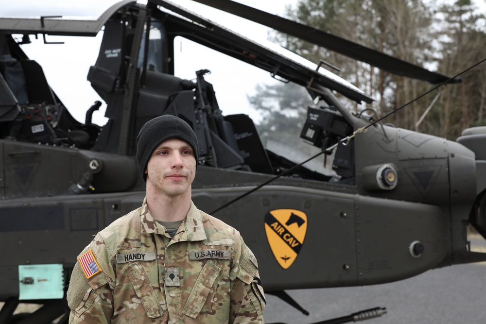 Air Cavalry Soldier Conducts Repairs on an AH-64 Electrical System