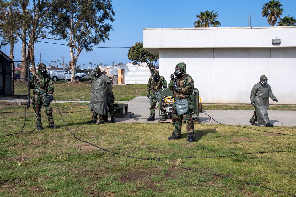 US Navy Seabees with NMCB-5 train on decon of simulated CBR contaminates